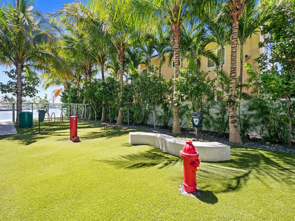 321 North Birch Road, Unit 502 Fort Lauderdale, FL 33304 - Photo 54 of 56 a view of a swimming pool with a yard
