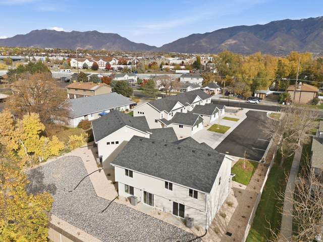 1627 North Angel Street Layton, UT 84041 - Photo 23 of 39 Aerial perspective of suburban area featuring mountains
