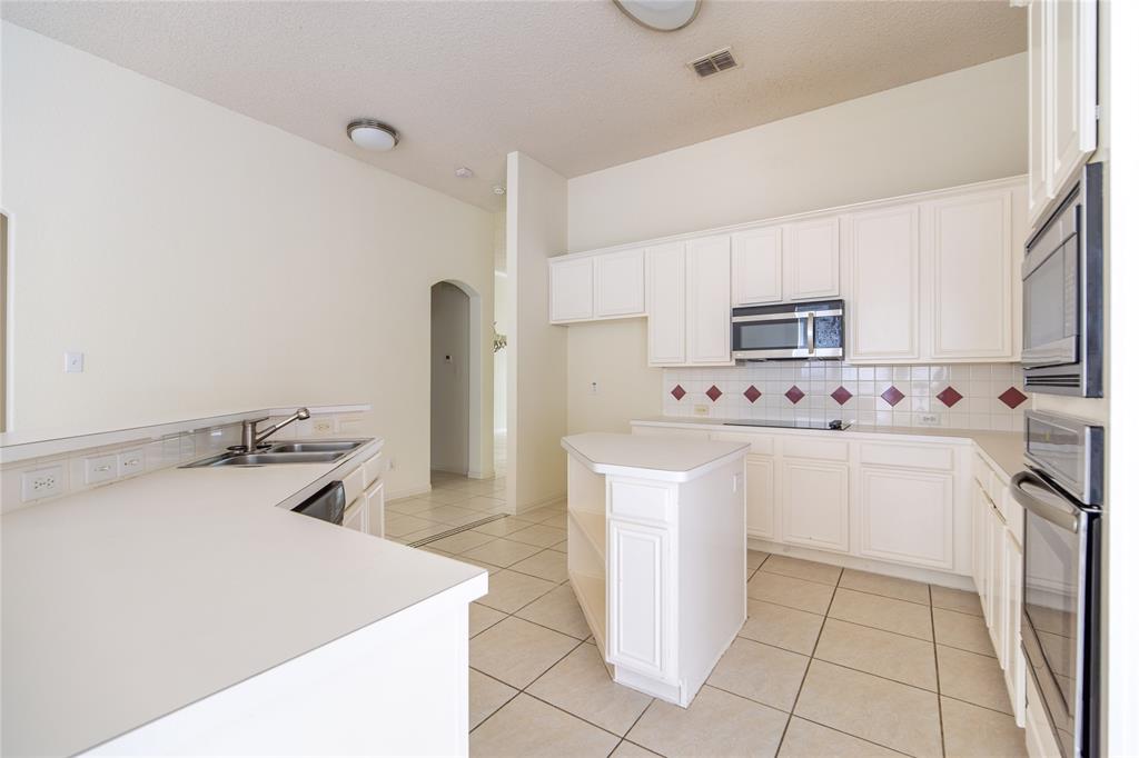 8216 Spring Valley Lane Plano, TX 75025 - Photo 7 of 26