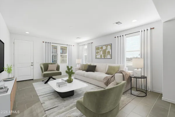 a living room with furniture and a large window