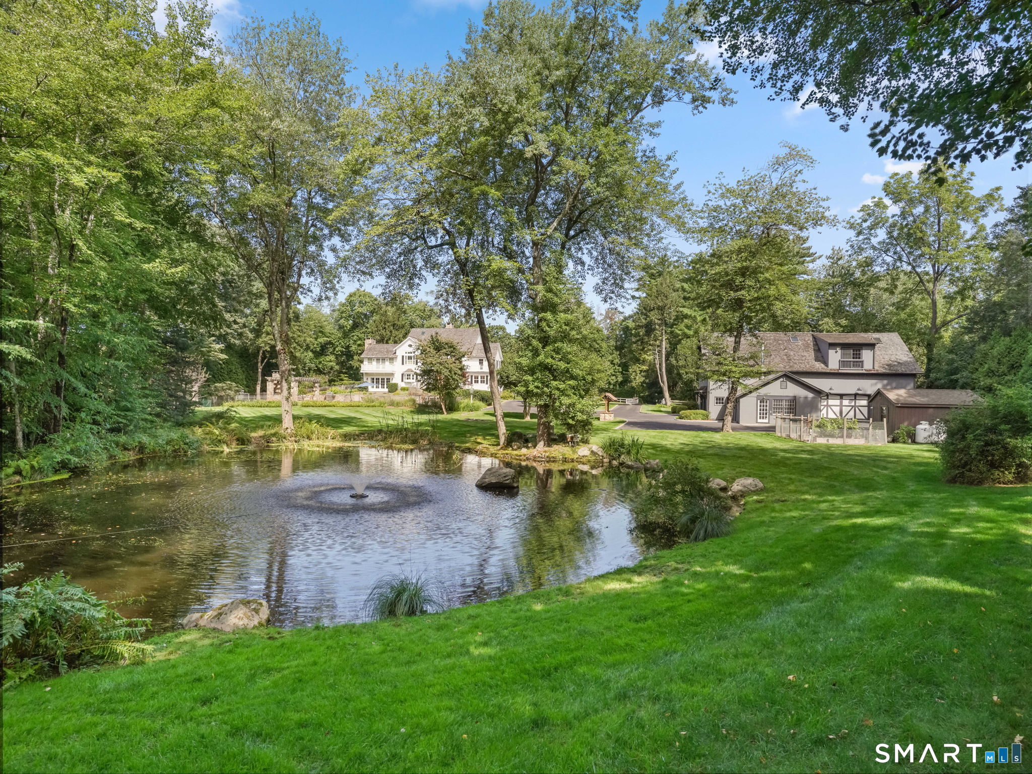 149 Dudley Road Wilton, CT 06897 - Photo 39 of 40 Pond with Aerator Fountain