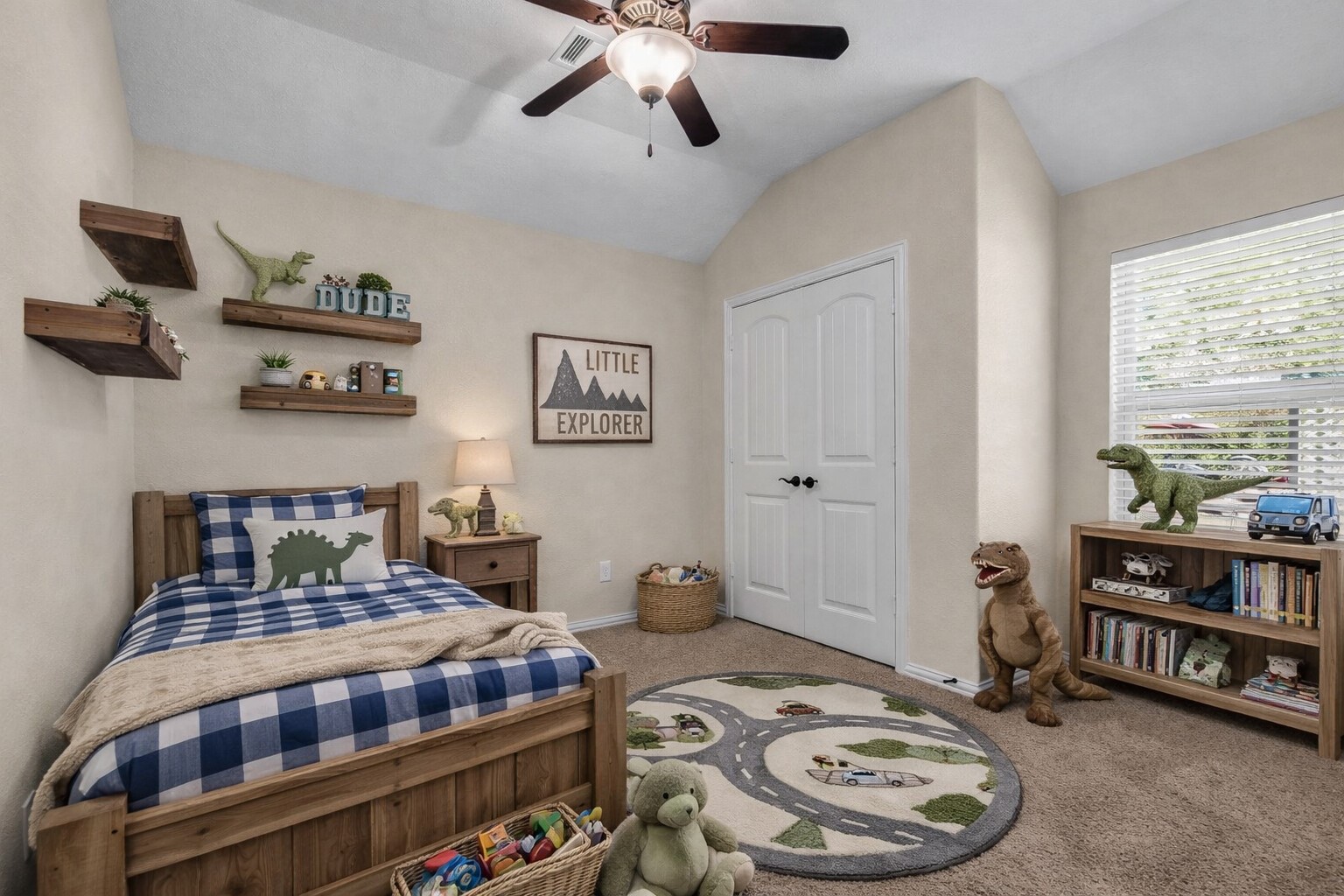 9023 South Comanche Circle Willis, TX 77378 - Photo 15 of 28 a bedroom with a bed a books bucket with a large window