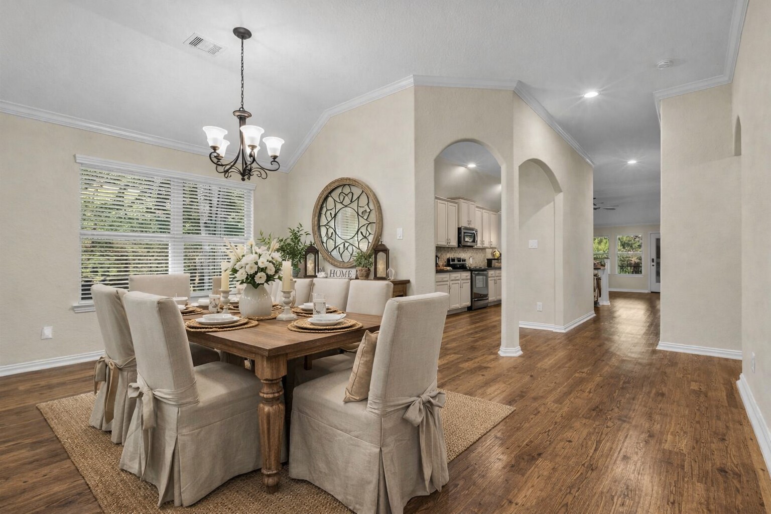 9023 South Comanche Circle Willis, TX 77378 - Photo 4 of 28 a view of a dining room with furniture window and wooden floor