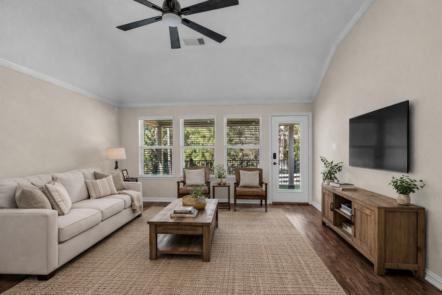 9023 South Comanche Circle Willis, TX 77378 - Photo 9 of 28 a living room with furniture and a flat screen tv