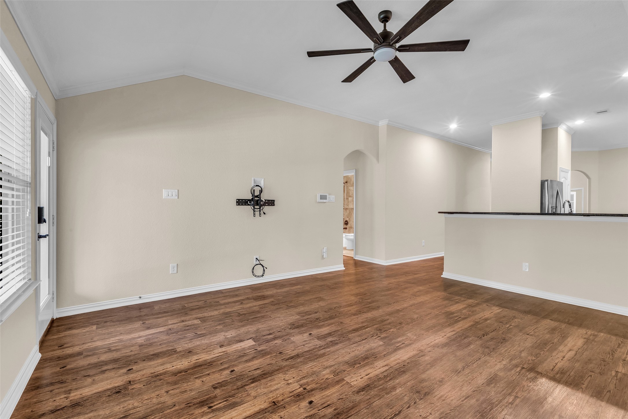 9023 South Comanche Circle Willis, TX 77378 - Photo 10 of 28 a view of a kitchen with a sink and a refrigerator