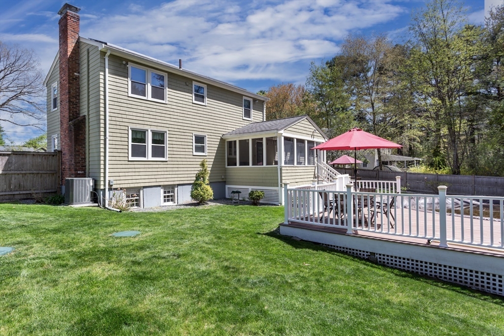 19 Colt Road Franklin, MA 02038 - Photo 2 of 36 a view of a house with a yard and a deck