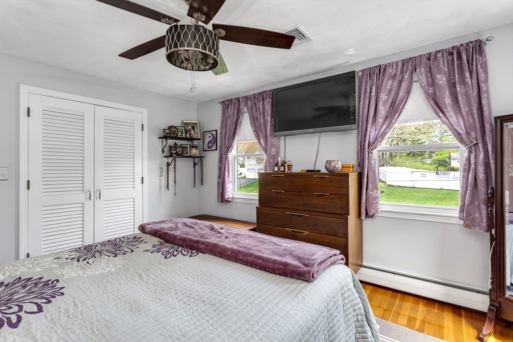19 Colt Road Franklin, MA 02038 - Photo 22 of 36 a bedroom with a bed dresser and a window