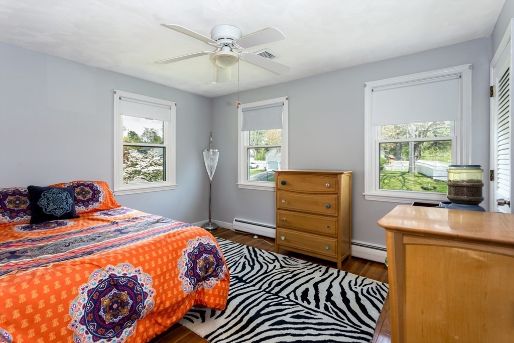 19 Colt Road Franklin, MA 02038 - Photo 23 of 36 a bedroom with a bed and a window