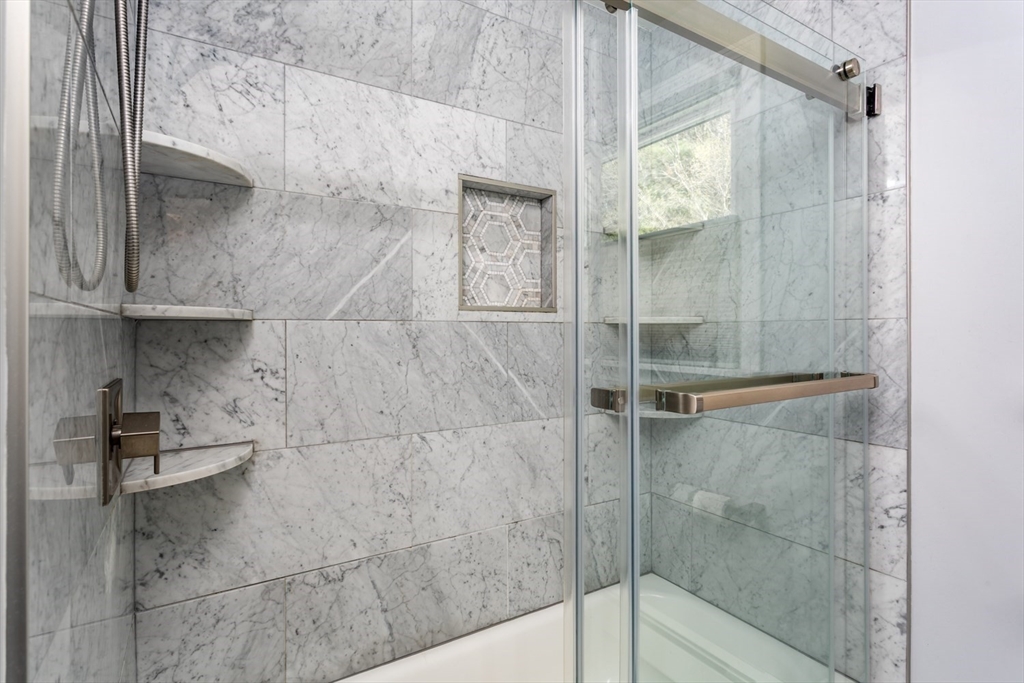 19 Colt Road Franklin, MA 02038 - Photo 29 of 36 a bathroom with a shower