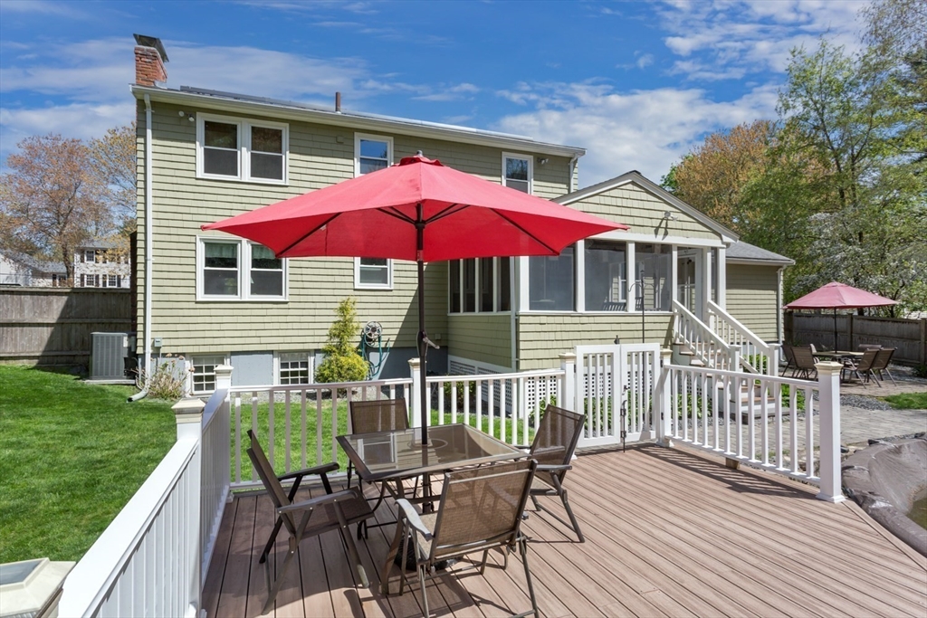 19 Colt Road Franklin, MA 02038 - Photo 31 of 36 a view of a house with a yard and furniture