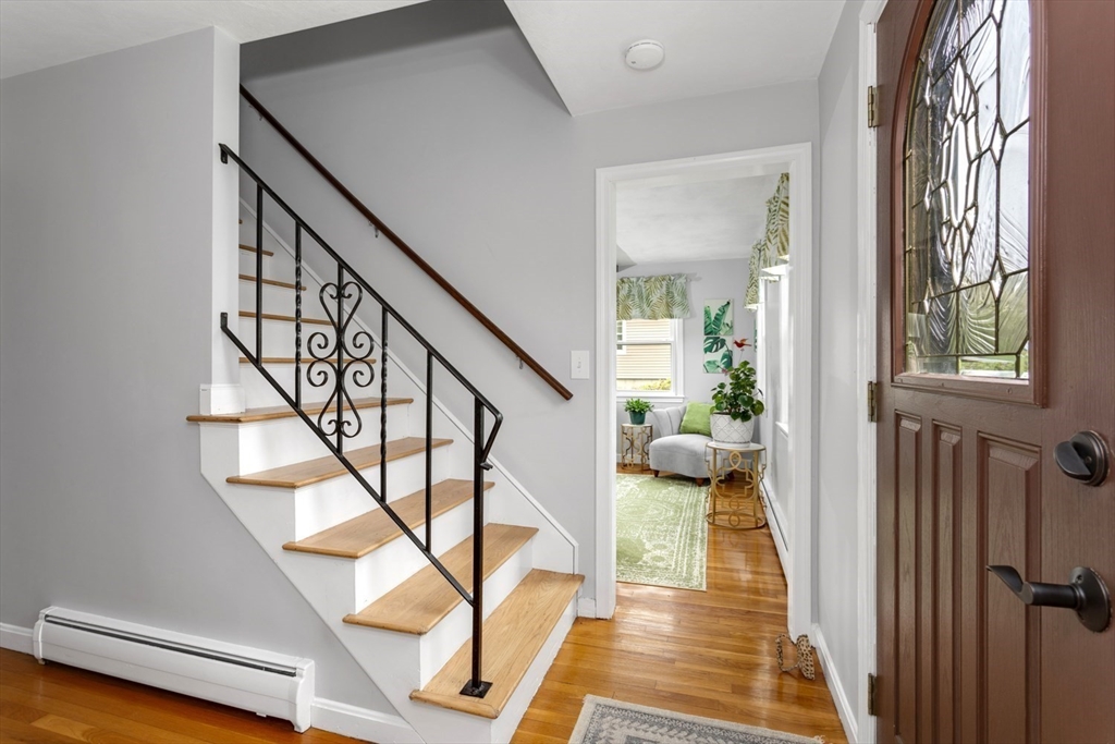 19 Colt Road Franklin, MA 02038 - Photo 5 of 36 a view of entryway and hall with wooden floor