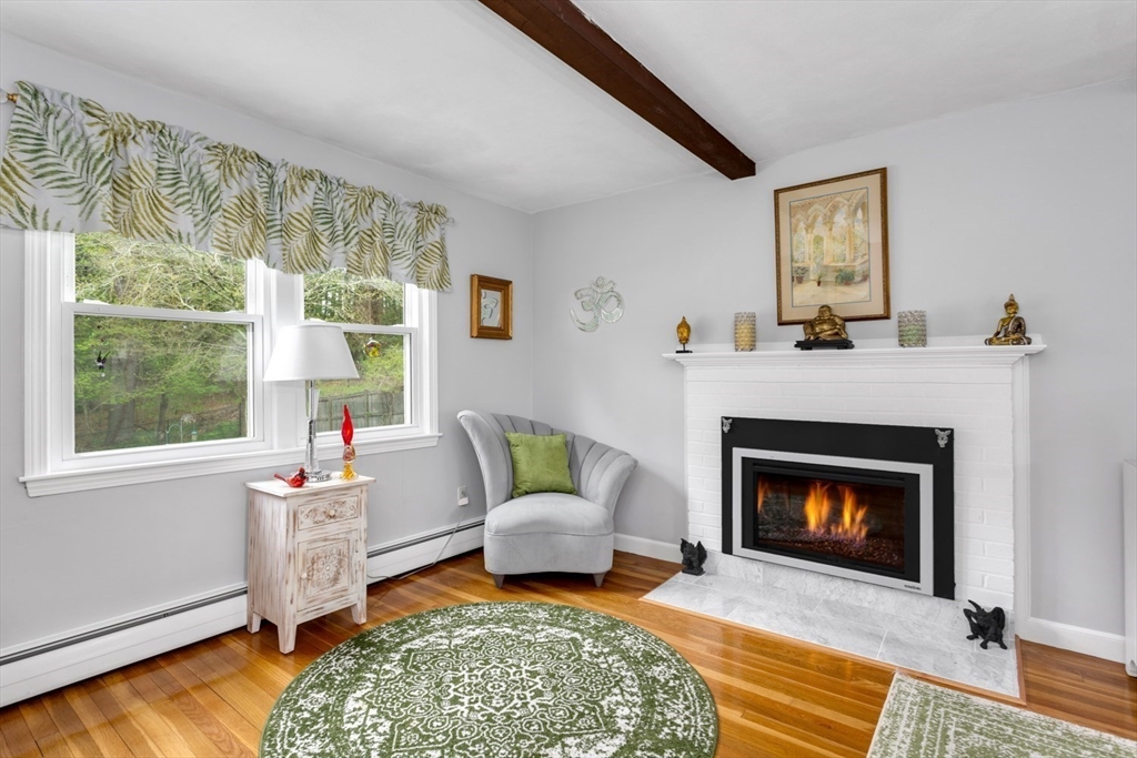 19 Colt Road Franklin, MA 02038 - Photo 8 of 36 a living room with furniture and a fireplace