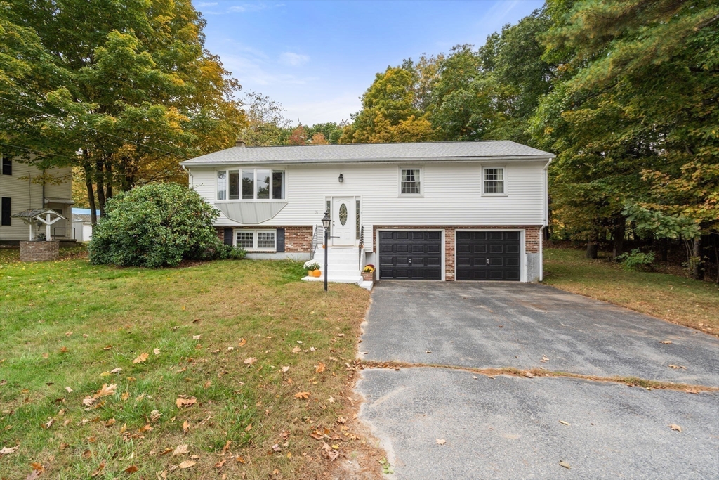 36 Depot Road Templeton, MA 01468 - Photo 32 of 38 a front view of house with yard and trees