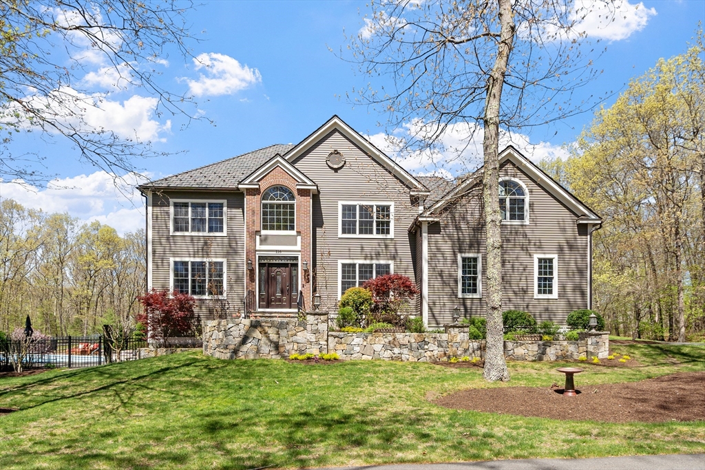 116 Coburn Road Berlin, MA 01503 - Photo 1 of 42 a front view of a house with a yard