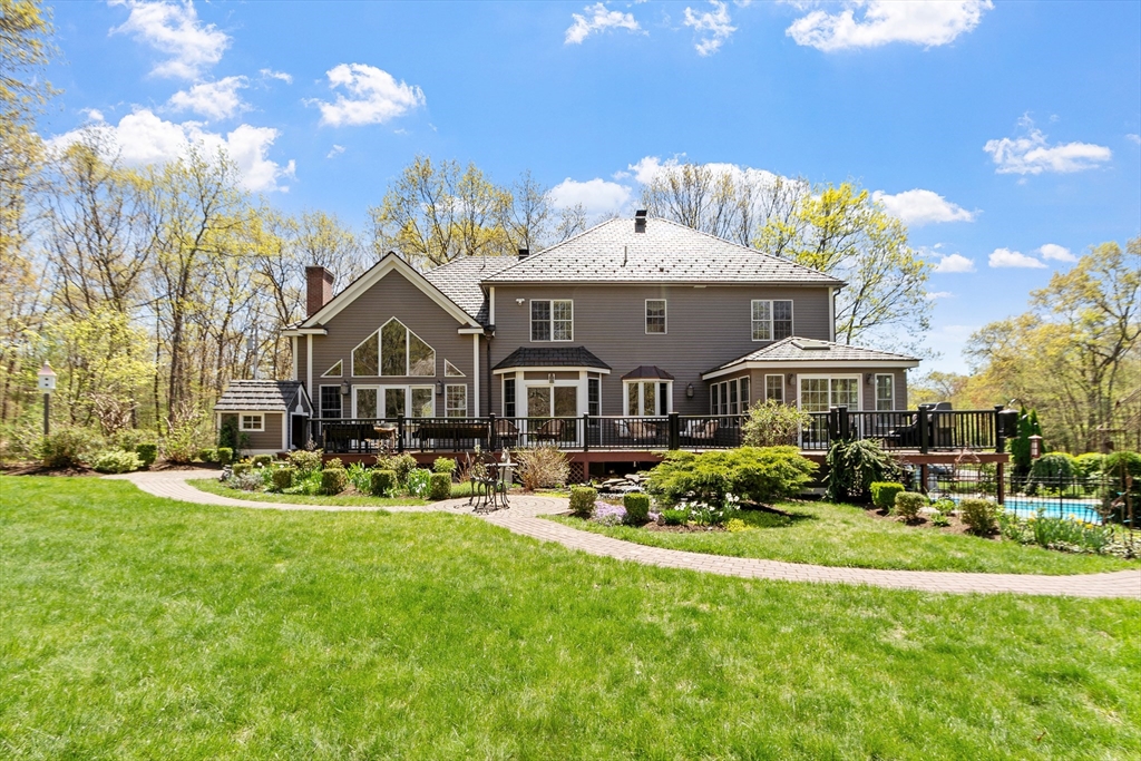 116 Coburn Road Berlin, MA 01503 - Photo 2 of 42 a front view of a house with garden