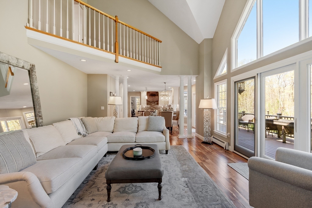 116 Coburn Road Berlin, MA 01503 - Photo 21 of 42 a living room with furniture or couch and a large window