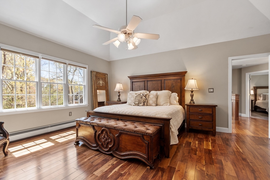 116 Coburn Road Berlin, MA 01503 - Photo 25 of 42 a bedroom with a bed and wooden floor