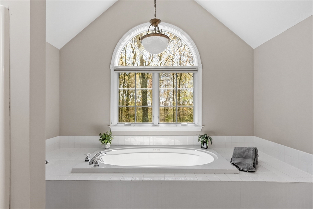 116 Coburn Road Berlin, MA 01503 - Photo 26 of 42 a bathroom with a bathtub and a window