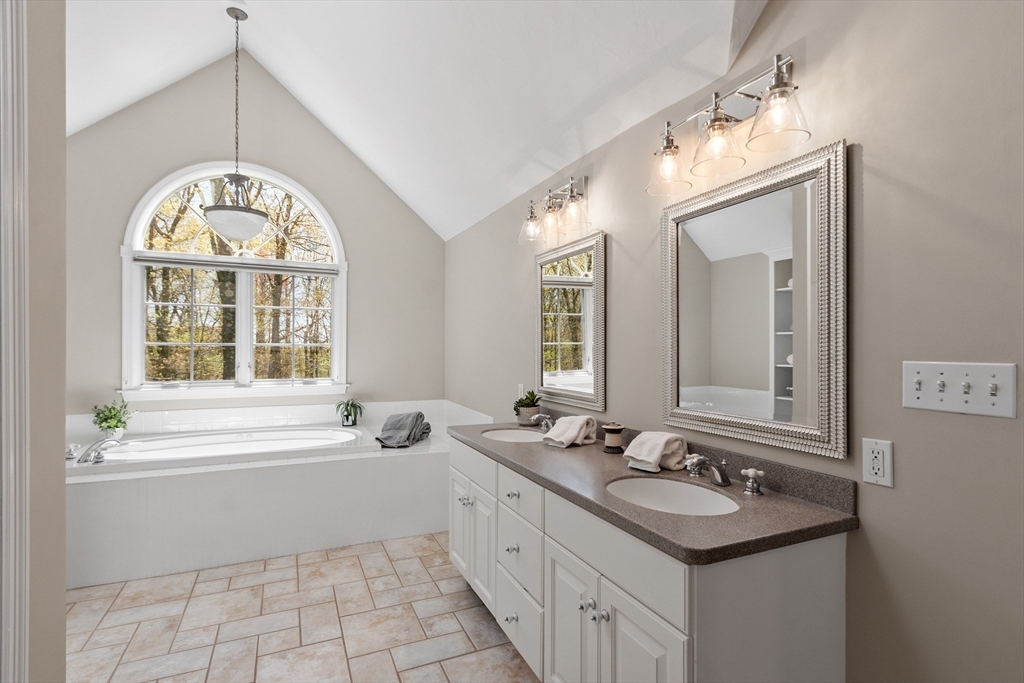 116 Coburn Road Berlin, MA 01503 - Photo 27 of 42 a bathroom with a sink and a mirror