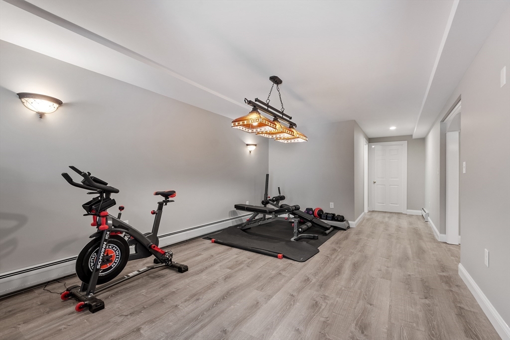 116 Coburn Road Berlin, MA 01503 - Photo 35 of 42 a view of a room with gym equipment