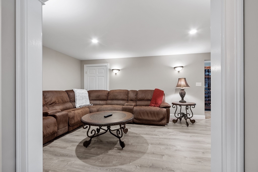 116 Coburn Road Berlin, MA 01503 - Photo 37 of 42 a living room with furniture and a table