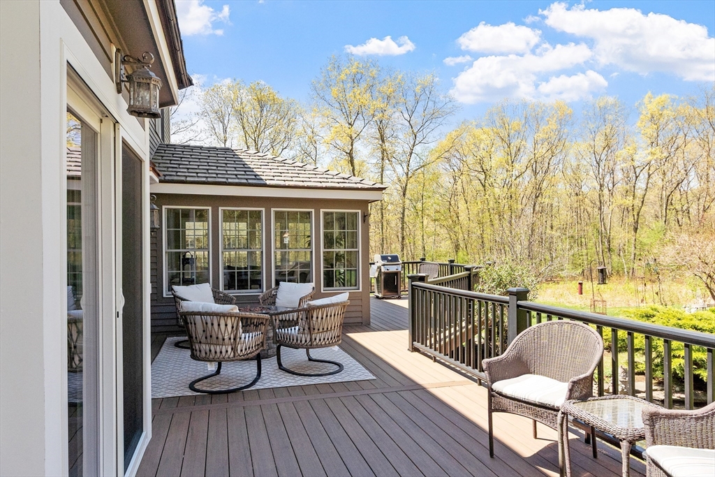 116 Coburn Road Berlin, MA 01503 - Photo 39 of 42 a balcony with table and chairs