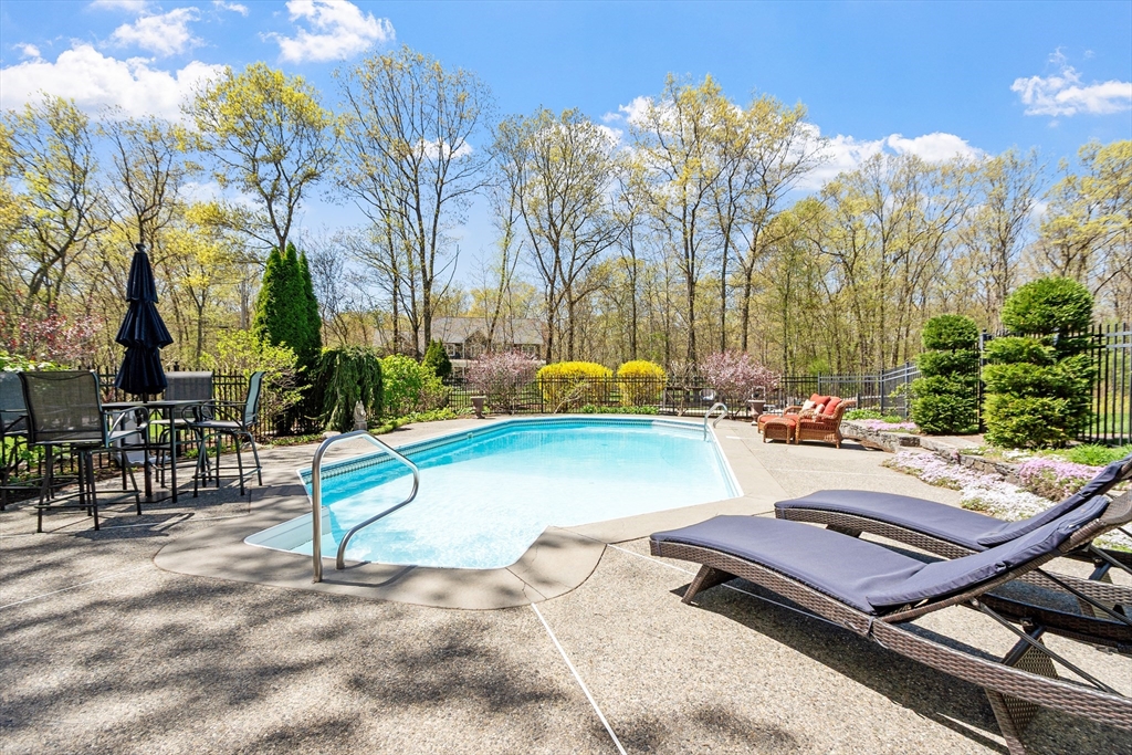 116 Coburn Road Berlin, MA 01503 - Photo 4 of 42 a view of a backyard with sitting area