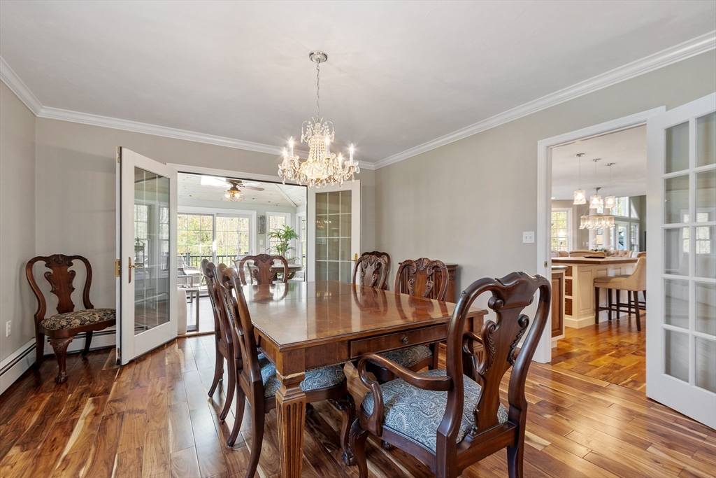 116 Coburn Road Berlin, MA 01503 - Photo 8 of 42 a view of a dining room with furniture window and wooden floor