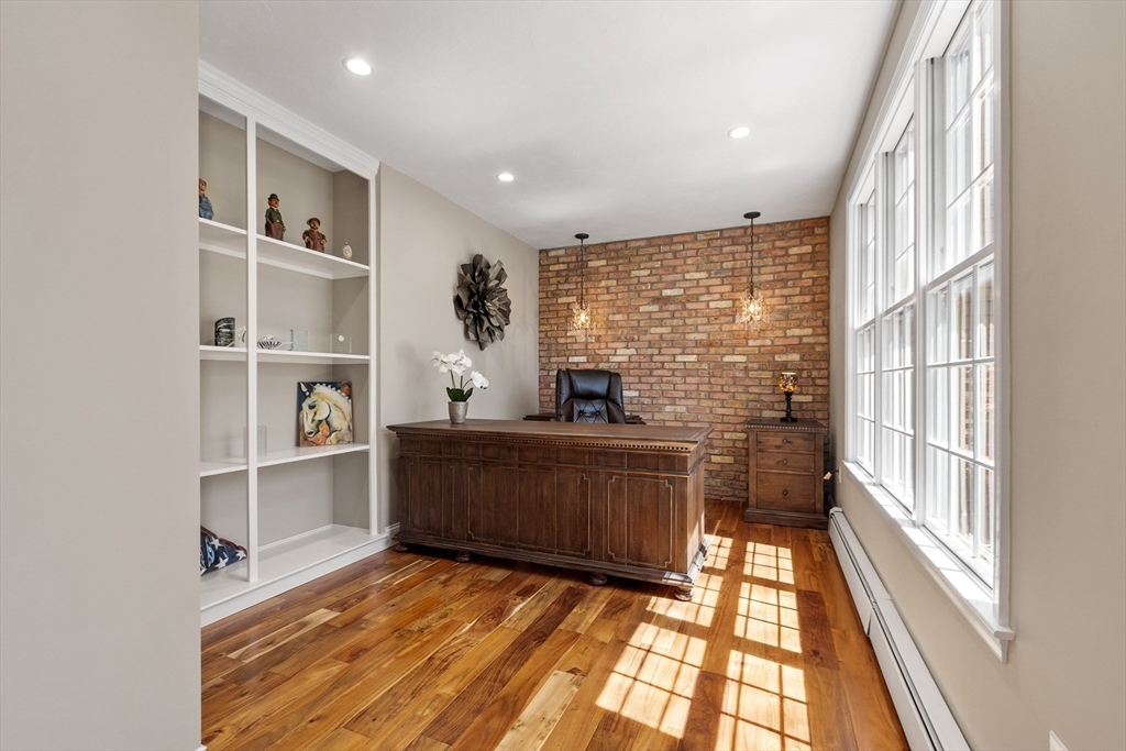 116 Coburn Road Berlin, MA 01503 - Photo 10 of 42 a room with wooden floor and furniture