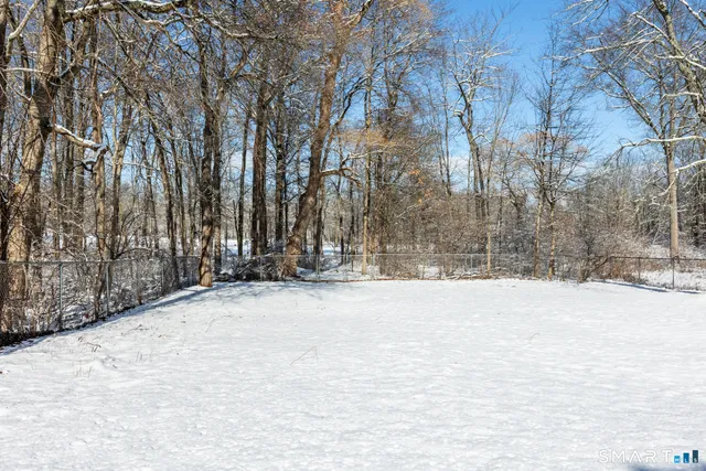 a view of snow on a road