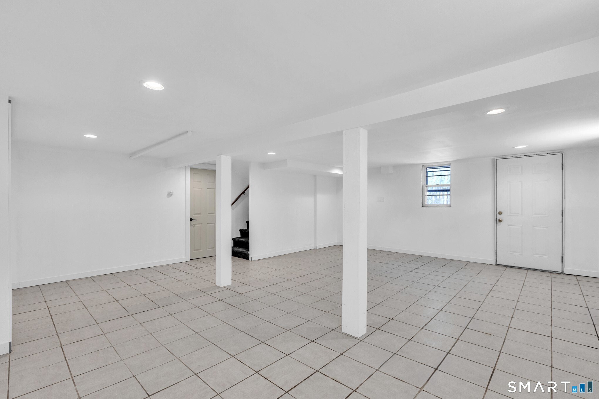 22 Mohawk Circle Newington, CT 06111 - Photo 37 of 39 an empty room with white walls and tiles