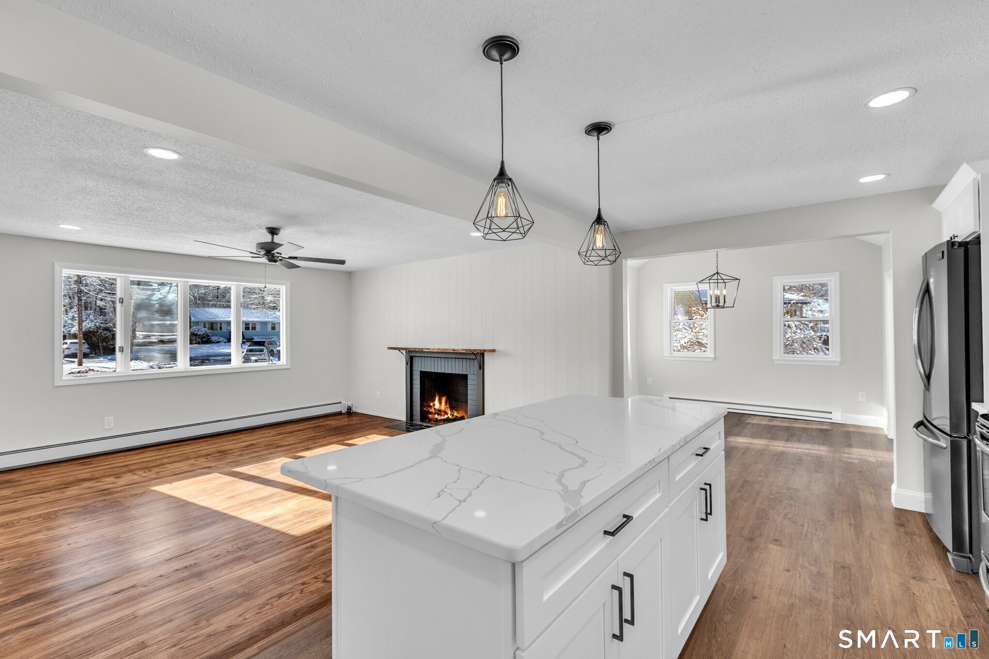 22 Mohawk Circle Newington, CT 06111 - Photo 5 of 39 a kitchen with stainless steel appliances granite countertop a stove and a wooden floor