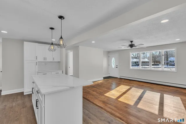a view of kitchen and sink