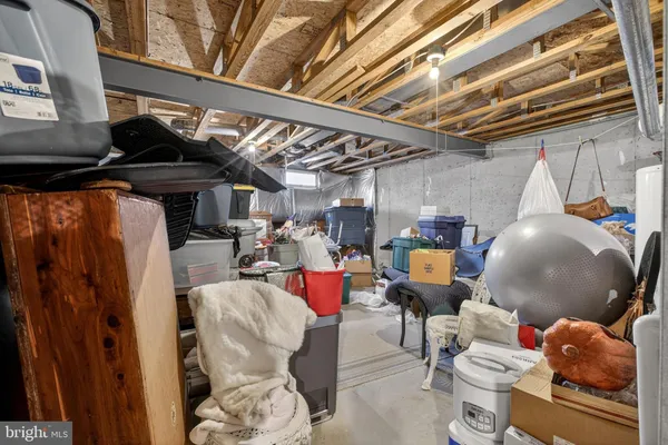 a living room with lots of furniture and a view of living room