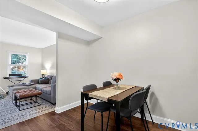 a view of a livingroom with furniture and window