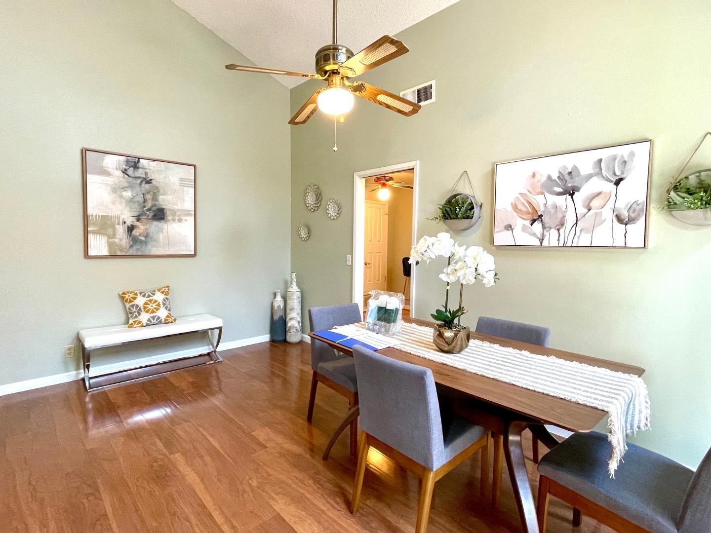22801 Longdown Road Cupertino, CA 95014 - Photo 6 of 25 a view of a dining room with furniture and wooden floor