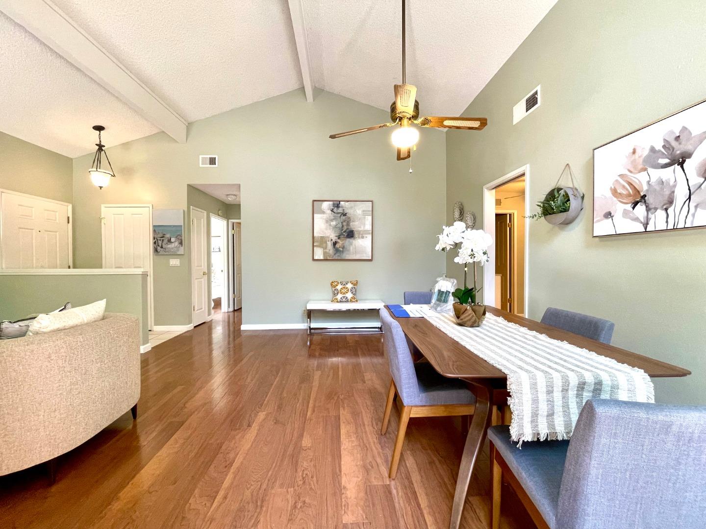 22801 Longdown Road Cupertino, CA 95014 - Photo 7 of 25 a view of a dining room with furniture and wooden floor