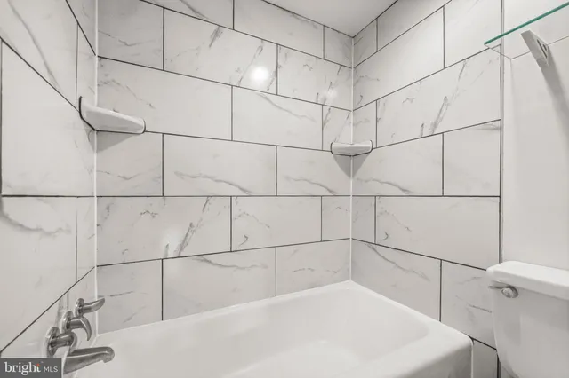 a bathroom with a bathtub