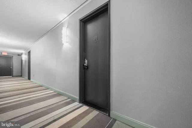 a picture of a park with a white wall