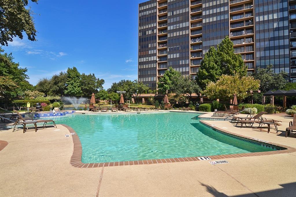 5200 Keller Springs Road, Unit 615 Dallas, TX 75248 - Photo 4 of 9 a view of a swimming pool with a patio