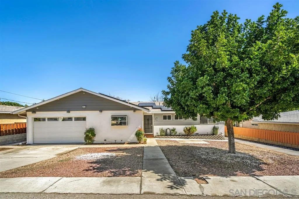8311 Sunset Road Lakeside, CA 92040 - Photo 1 of 25 a front view of a house with a yard