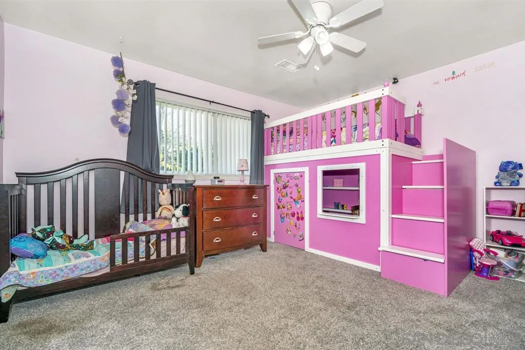8311 Sunset Road Lakeside, CA 92040 - Photo 14 of 25 a bedroom with furniture and a window