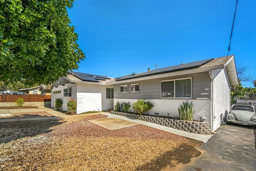 8311 Sunset Road Lakeside, CA 92040 - Photo 18 of 25 a front view of a house with garden