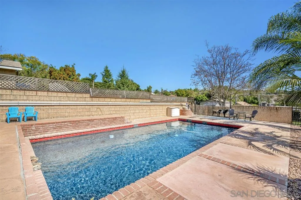 8311 Sunset Road Lakeside, CA 92040 - Photo 19 of 25 a view of a swimming pool and an outdoor space