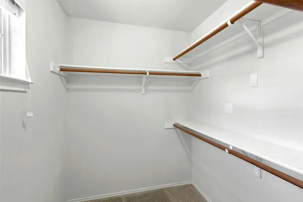 a view of small space with racks on the wall