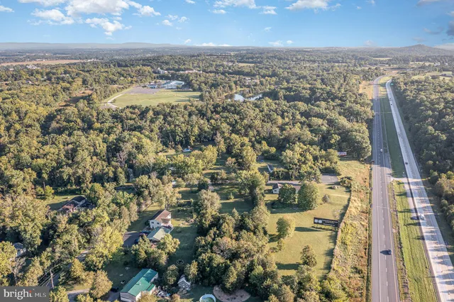 an aerial view of residential building with parking space