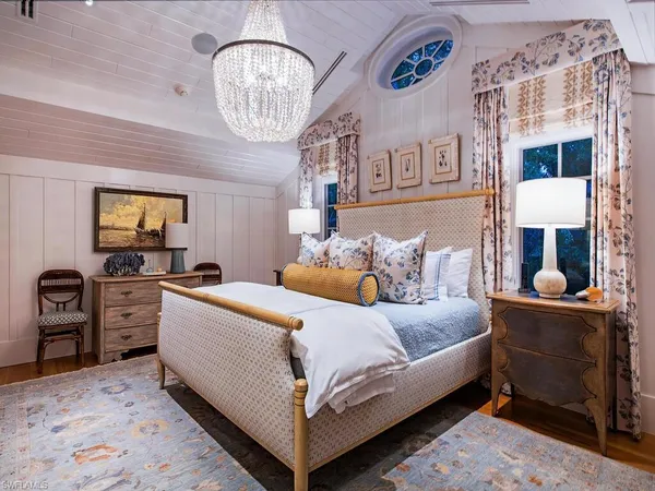 a view of a room that has a table and chairs