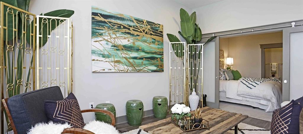 8110 Park Lane, Unit 901 Dallas, TX 75231 - Photo 12 of 18 a view of a balcony with furniture and a potted plant