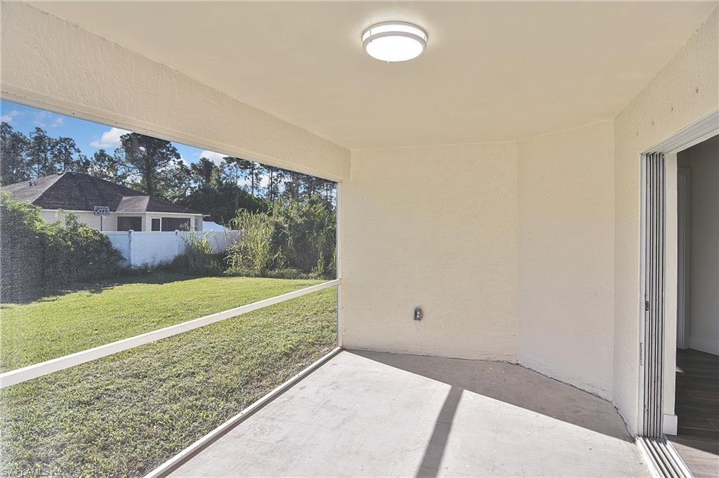 785 Homestead Road South Lehigh Acres, FL 33974 - Photo 45 of 49 a view of a back yard