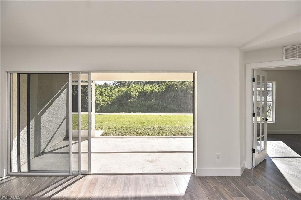785 Homestead Road South Lehigh Acres, FL 33974 - Photo 9 of 49 a view of a room with a large window